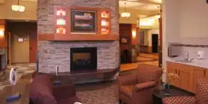 A large fireplace at Pine Ridge Post Acute