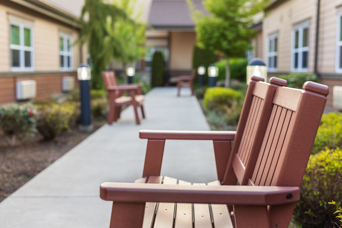 An outdoor area with benches at Pine Ridge
